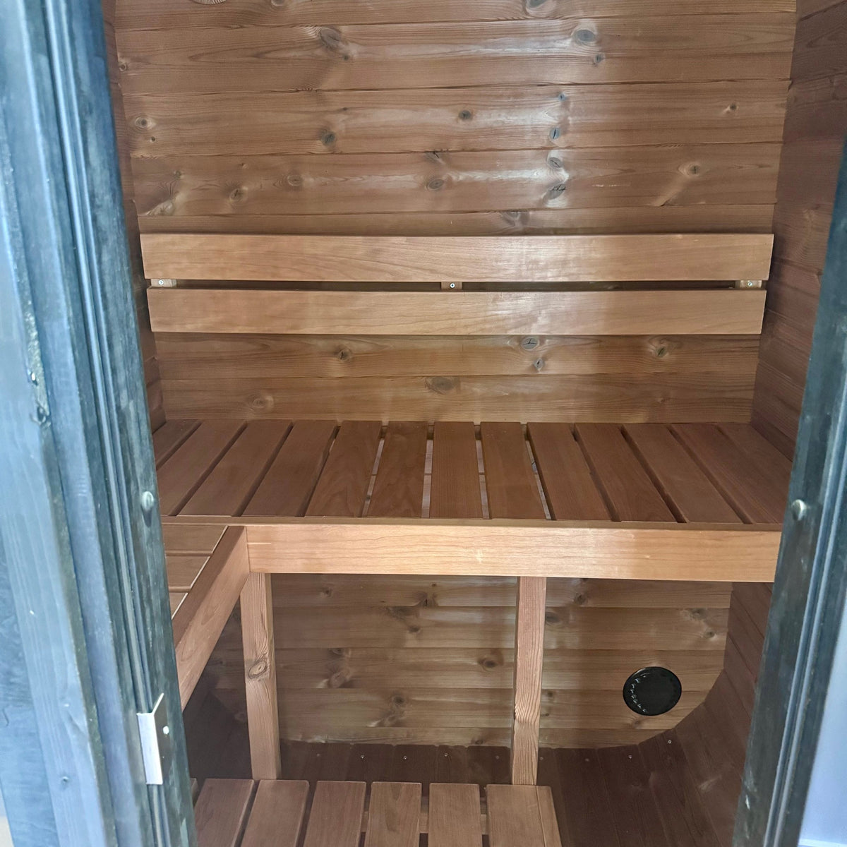Interior benches of the SaunaLife CL3G 2-Person Outdoor Cube Sauna in the Sun Valley Saunas showroom