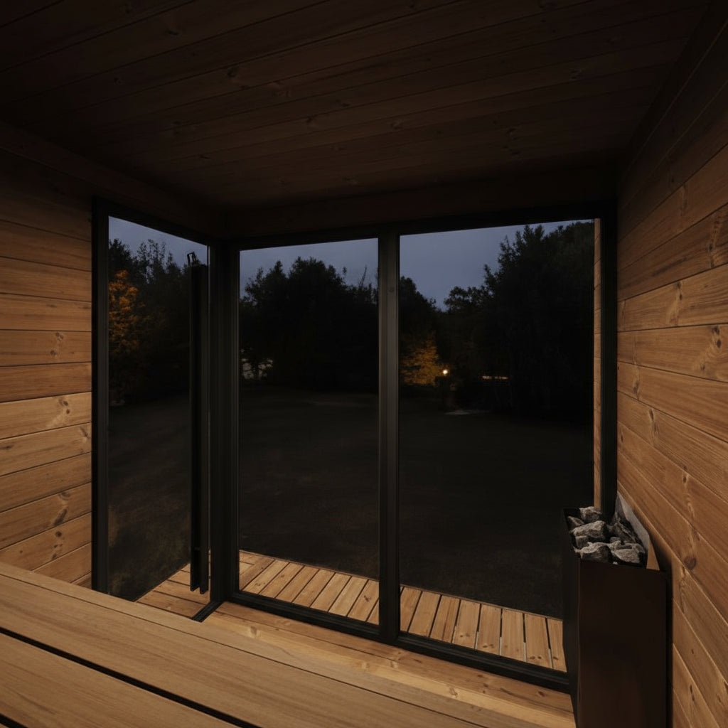 Wooden sauna with glass doors at night