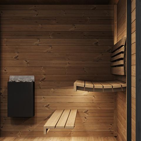 Wooden sauna with benches and a heater on a wooden wall.