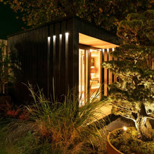 Load image into Gallery viewer, Saunum AirCube 3 Outdoor Sauna with trees and plants