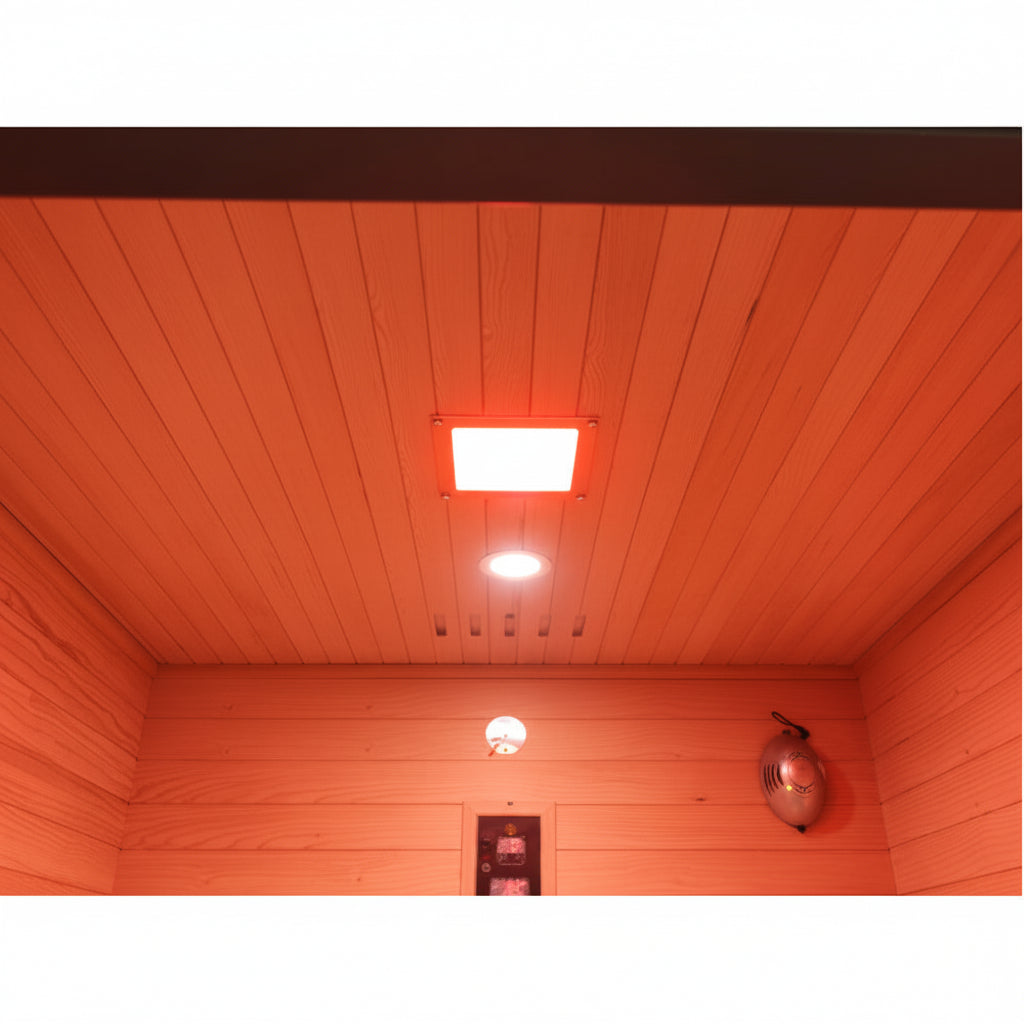 Wooden interior of a sauna with red lighting