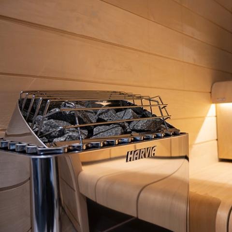Harvia Kip electric sauna heater mounted on the wall