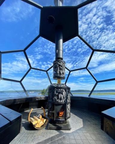 Harvia Legend 240 GreenFlame in a glass dome sauna