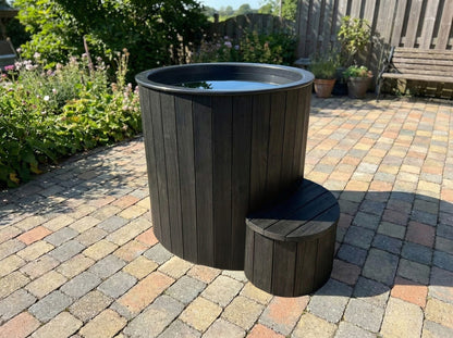 SaunaLife S1 black cold plunge on a patio