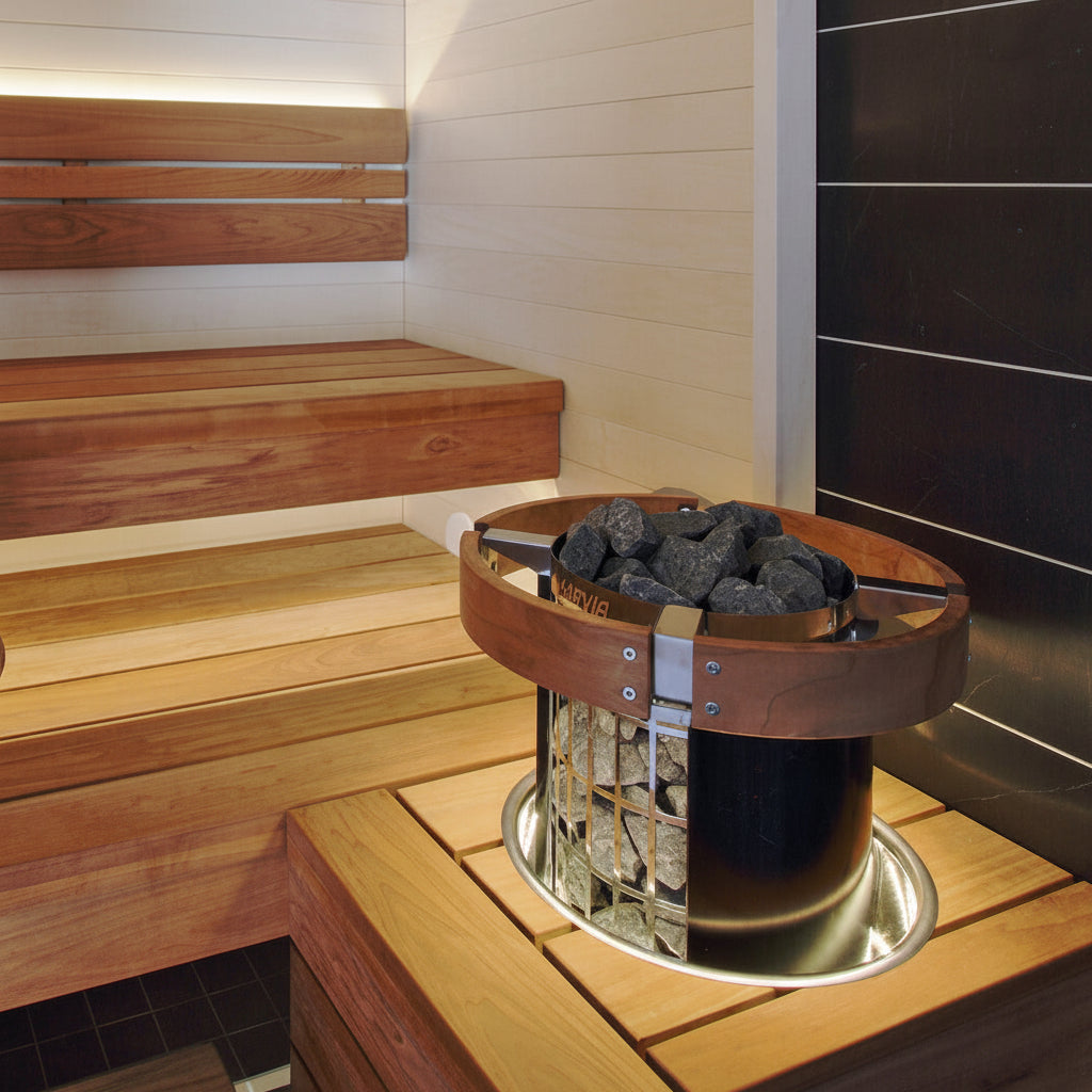 Harvia Cilindro Electric Sauna Heater in small sauna with safety rail