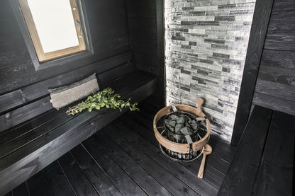 Harvia Cilindro Electric Sauna Heater sunken in sauna with safety railing